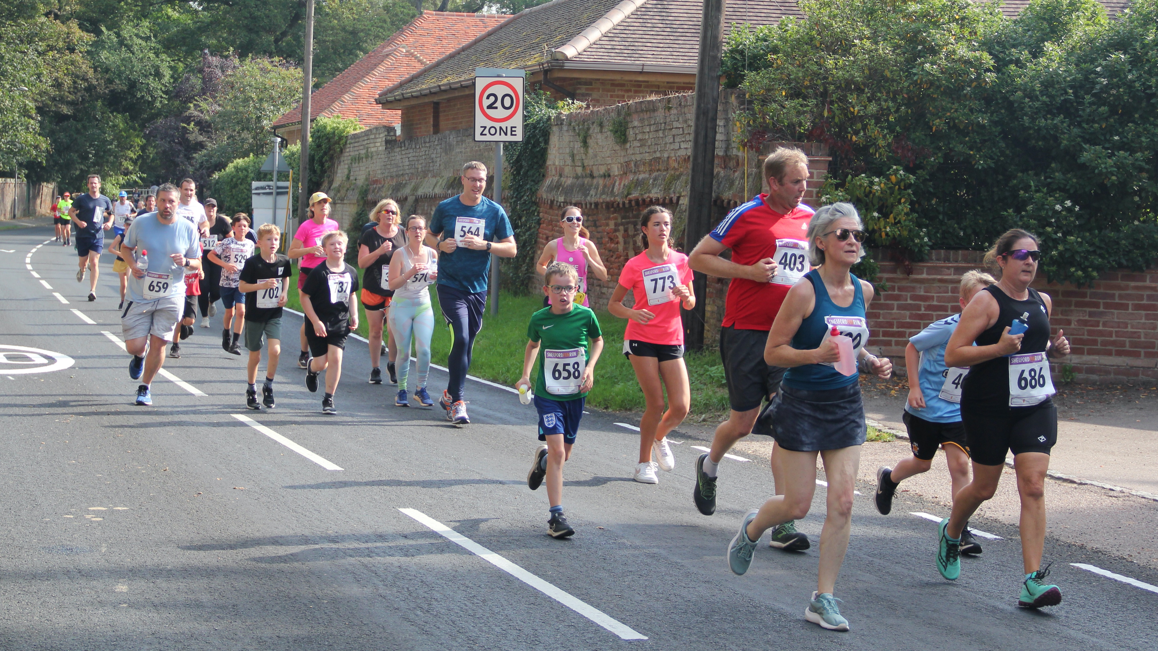 Photo of Shelford fun runners running in the road